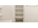 Close up shot of bright bathroom shelving at 37112 W Prado St, Maricopa, AZ 85138