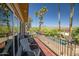 Spacious balcony with desert views and comfortable seating at 37300 N Tom Darlington Dr # D, Carefree, AZ 85377