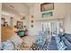 Spacious living area with staircase, contemporary decor, and glass doors for ample natural light at 37300 N Tom Darlington Dr # D, Carefree, AZ 85377