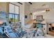 Open-concept living room boasting high ceilings, large windows, and stylish furnishings at 37300 N Tom Darlington Dr # D, Carefree, AZ 85377