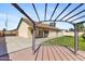 Backyard with well-kept lawn, patio, and pergola at 4007 W Thunderbird Rd, Phoenix, AZ 85053