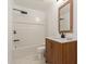 Bathroom featuring wood vanity and framed mirror at 4232 N 112Th Ln, Phoenix, AZ 85037
