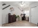 Bedroom featuring wood floors, desk and chair at 4232 N 112Th Ln, Phoenix, AZ 85037