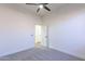 Clean bedroom featuring carpeted floors, and simple trim at 4356 E Carriage Way, Gilbert, AZ 85297