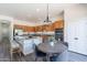 Large kitchen with stainless appliances, bar seating, and eat-in kitchen at 4356 E Carriage Way, Gilbert, AZ 85297