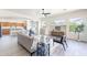 Bright living room with modern decor, wood floors, and many windows at 4356 E Carriage Way, Gilbert, AZ 85297