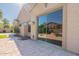 View of patio and fire pit area with large sliding glass doors, enhancing indoor-outdoor living experience at 4356 E Carriage Way, Gilbert, AZ 85297