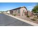 A charming single story home featuring gravel landscaping and a two car garage at 4646 E Maplewood St, Gilbert, AZ 85297