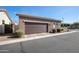 This two-car garage is attached and has gravel landscaping at 4646 E Maplewood St, Gilbert, AZ 85297