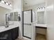 This spacious main bathroom features double sinks and a walk-in shower at 4646 E Maplewood St, Gilbert, AZ 85297