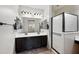 This main bathroom features double sinks, a shower, and tile floors at 4646 E Maplewood St, Gilbert, AZ 85297