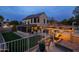 Scenic backyard view from the patio, featuring a well-manicured lawn and an inviting outdoor dining area at 4715 E Carmen St, Phoenix, AZ 85044