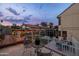 Charming backyard patio with cozy seating, overlooking a well-maintained lawn and outdoor dining area at 4715 E Carmen St, Phoenix, AZ 85044