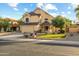 Charming two-story home featuring a well-manicured lawn and inviting curb appeal at 4715 E Carmen St, Phoenix, AZ 85044