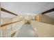 Second-floor hallway with natural light offers access to bedrooms and other living spaces, enhancing the home's functionality at 4715 E Carmen St, Phoenix, AZ 85044