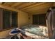 Relaxing hot tub situated in a covered outdoor space, offering a private spa experience with natural light at 4715 E Carmen St, Phoenix, AZ 85044