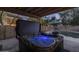 The bubbling hot tub is a backyard centerpiece, complemented by an inviting pool area for ultimate relaxation and leisure at 4715 E Carmen St, Phoenix, AZ 85044