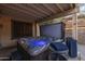 Covered hot tub on patio, providing a private and comfortable space for relaxation and rejuvenation, near patio pool and backyard at 4715 E Carmen St, Phoenix, AZ 85044