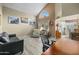 Comfortable living room with a vaulted ceiling, clerestory window, neutral decor, and lots of space for furniture at 4715 E Carmen St, Phoenix, AZ 85044