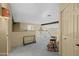 Cozy loft space with neutral tones, perfect for a home office or reading nook, featuring natural light and ample storage at 4715 E Carmen St, Phoenix, AZ 85044
