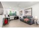 Living room/office space with a desk, couch, art, and a large window at 4835 E Onyx Ave, Paradise Valley, AZ 85253
