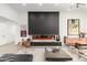 Bright living room features a sleek fireplace and modern decor at 4835 E Onyx Ave, Paradise Valley, AZ 85253