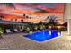 This beautiful backyard features a modern pool and lounge chairs, perfect for relaxation at 4835 E Onyx Ave, Paradise Valley, AZ 85253