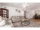 Bright living room flows into dining area, showcasing comfortable seating and stylish decor for easy living at 4950 N Miller Rd # 200, Scottsdale, AZ 85251