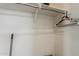 A walk in closet with a bar for hanging clothes at 5048 N 84Th Dr, Glendale, AZ 85305