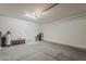 Garage with room for parking and storage, as well as a door to the house at 5048 N 84Th Dr, Glendale, AZ 85305