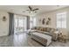 Comfortable living room with ample seating, natural light, and sliding door access to patio at 5048 N 84Th Dr, Glendale, AZ 85305