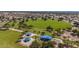 Beautiful aerial view of park with green space, walking trails, and shade structures at 530 N Jesse Ct, Chandler, AZ 85225