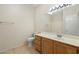 Neutral bathroom features a light countertop and a light tile floor at 530 N Jesse Ct, Chandler, AZ 85225
