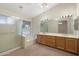 Bathroom featuring a walk-in shower, soaking tub, and double vanity with great lighting at 530 N Jesse Ct, Chandler, AZ 85225