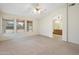 Bright and airy bedroom featuring three large windows and an en-suite bathroom at 530 N Jesse Ct, Chandler, AZ 85225