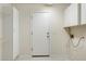 Spacious laundry room with storage cabinets at 530 N Jesse Ct, Chandler, AZ 85225