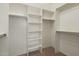 Large walk-in closet with ample shelving and hanging space for optimal organization at 530 N Jesse Ct, Chandler, AZ 85225
