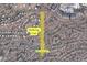 Aerial view of property near a walking trail, Cactus Shadows High School and various neighborhood streets at 5537 E Dusty Wren Dr, Cave Creek, AZ 85331