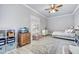 Bright bedroom with neutral walls, ceiling fan and ample natural light at 5537 E Dusty Wren Dr, Cave Creek, AZ 85331