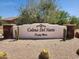 Entrance sign to Colina Del Norte community with desert landscaping including cacti and gravel at 5537 E Dusty Wren Dr, Cave Creek, AZ 85331