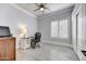 Bright office space featuring wood look floors and plantation shutters at 5537 E Dusty Wren Dr, Cave Creek, AZ 85331