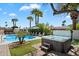 Lush backyard featuring a sparkling pool, relaxing hot tub, and serene lounge area at 6271 E Evans Dr, Scottsdale, AZ 85254
