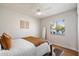 Well-lit bedroom featuring a double bed, natural light, and stylish neutral decor at 6271 E Evans Dr, Scottsdale, AZ 85254
