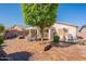 Spacious backyard featuring a patio, outdoor furniture, and drought-tolerant plants at 6397 S Pinaleno Pl, Chandler, AZ 85249