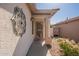 Close-up of the inviting front entrance, complete with stylish decor and an immaculate walkway at 6397 S Pinaleno Pl, Chandler, AZ 85249