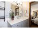 Well-lit bathroom showcases modern vanity, decorative shelving, and a stylish mirror at 6526 N 13Th Dr, Phoenix, AZ 85013