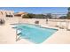 Sparkling community pool area with lounge chairs and shade, perfect for summer relaxation and recreation at 6526 N 13Th Dr, Phoenix, AZ 85013