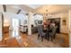 Open-concept living space featuring dining area, hardwood floors and living room at 6526 N 13Th Dr, Phoenix, AZ 85013