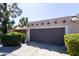 Street view of home showing garage, desert landscaping, and tile roof details at 6526 N 13Th Dr, Phoenix, AZ 85013