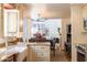 View of the kitchen showcasing granite counters, custom cabinets, and stainless steel appliances at 6526 N 13Th Dr, Phoenix, AZ 85013